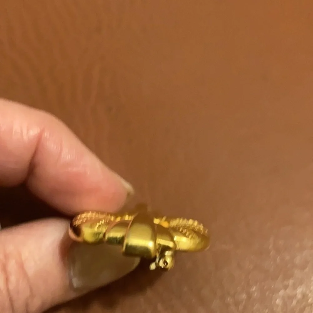 TAT signed gold tone Art Deco style pin